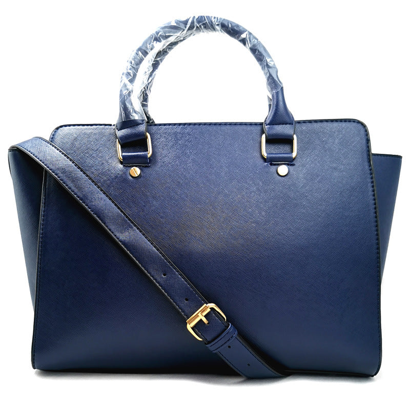 Smiley cross pattern shoulder bag