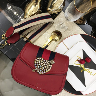 Butterfly buckle pouch