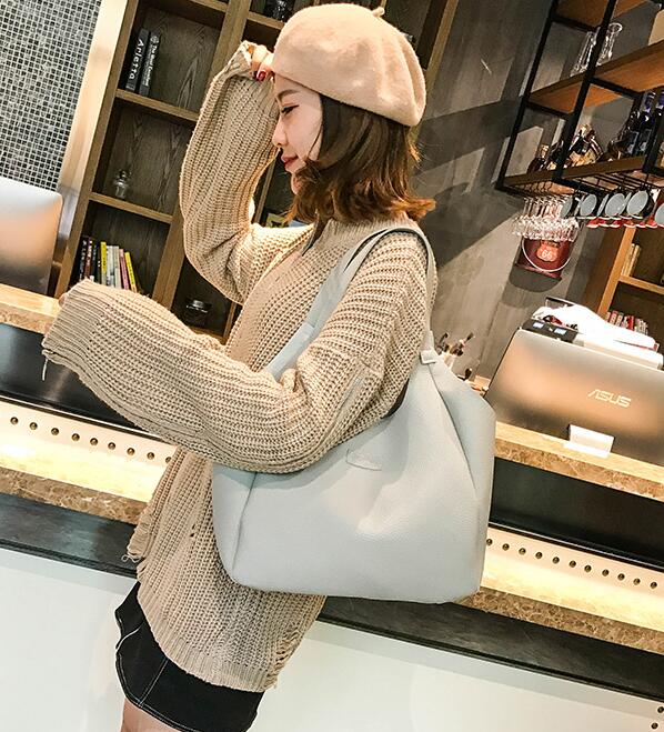 Dumplings four-piece portable PU shoulder bag Solid color lychee bag
